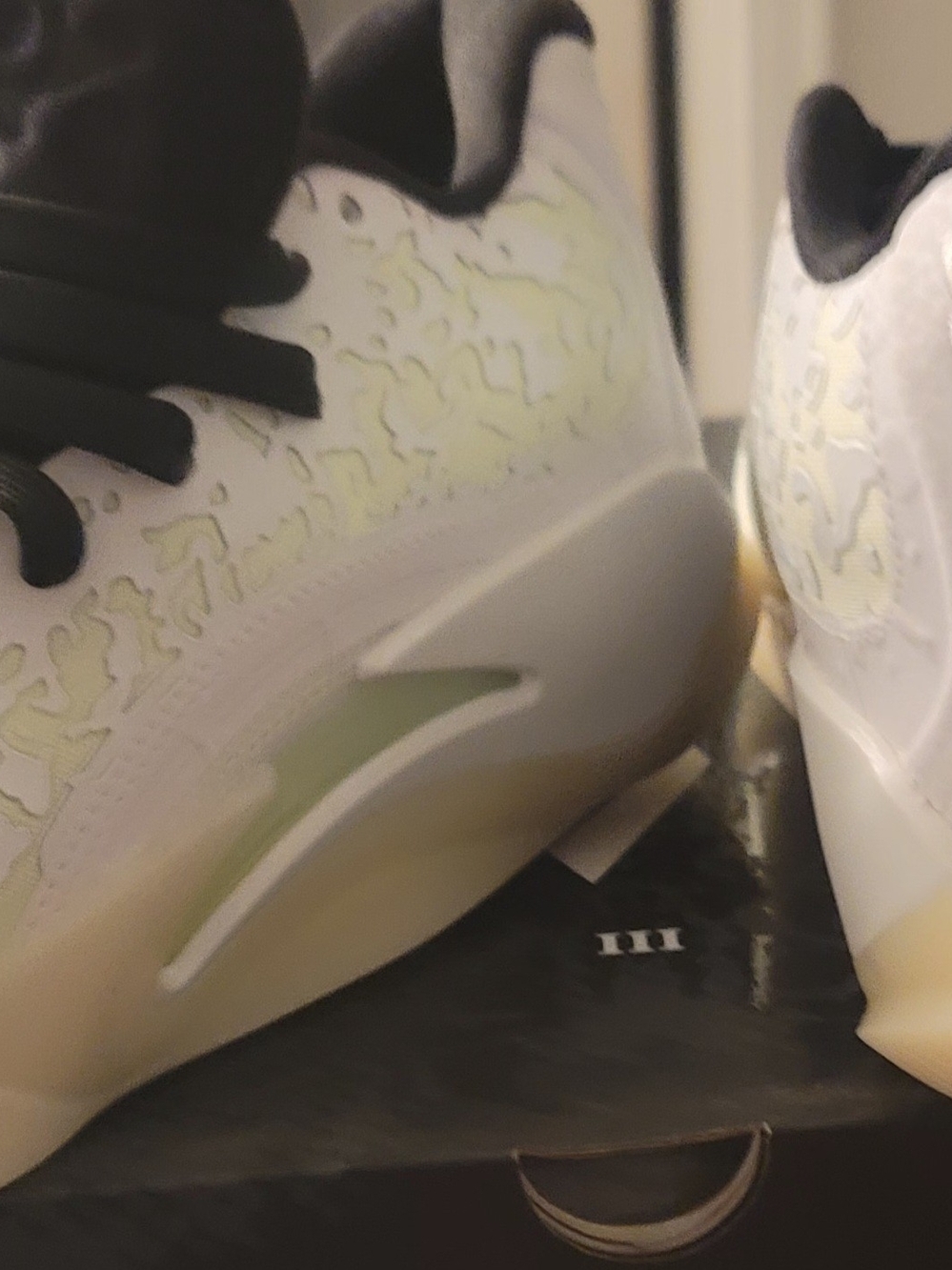 Jordan Men's White and Black Low-Top Sneakers with Pale Yellow Accents